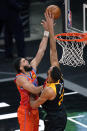 Utah Jazz center Rudy Gobert (27) blocks the shot of Oklahoma City Thunder forward Kenrich Williams, left, during the first half of an NBA basketball game Tuesday, April 13, 2021, in Salt Lake City. (AP Photo/Rick Bowmer)