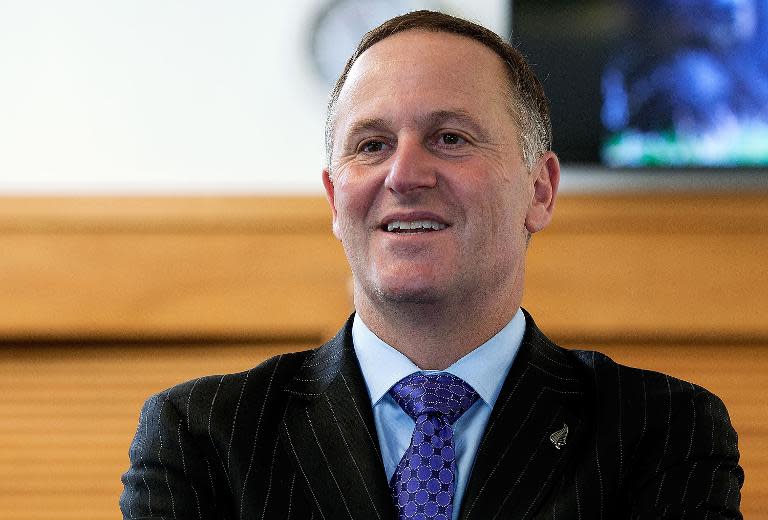 New Zealand Prime Minister John Key (pictured) decided not to attend Lee Kuan Yew's funeral and left behind a bruising byelection defeat to be in Melbourne to lead his nation's obsession with the World Cup final