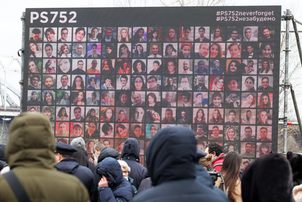 KIEV, UKRAINE - 2021/01/08: Portraits of dead passengers and pilots displayed on a large screen during the ceremony at the site of the future monument.
In memory of the victims of the flight PS752 on the first anniversary of the plane crash. Boeing 737-800 passenger plane flight PS752 of Ukraine International Airlines (UIA) crashed near the International Airport of Imam Khomeini in Tehran, Iran, shortly after taking off on January 8, 2020. All 176 people on board the airliner died.  Among them 11 Ukrainians - two passengers and nine crew members. Passengers of the airliner were citizens of Iran, Canada, Sweden, Afghanistan, Germany, and Great Britain. (Photo by Pavlo Gonchar/SOPA Images/LightRocket via Getty Images)