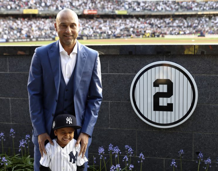 Retired New York Yankees shortstop Derek Jeter poses with his nephew Jalen Jeter during a pregame ceremony retiring his number 2 in Monument Park at Yankee Stadium in New York, Sunday, May 14, 2017. (AP Photo/Elsa, Pool)