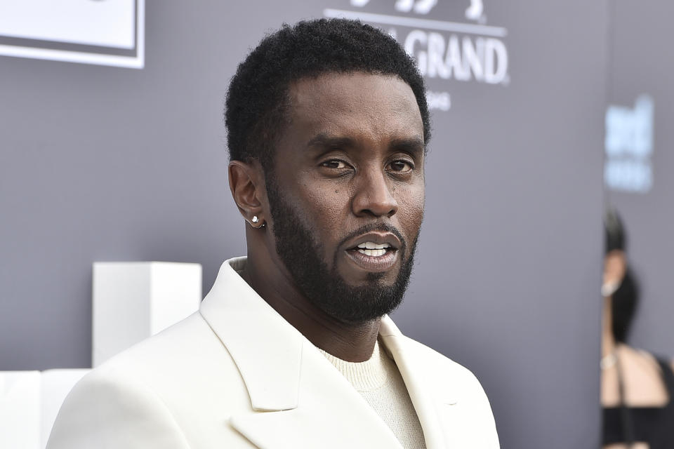 FILE - Music mogul and entrepreneur Sean "Diddy" Combs arrives at the Billboard Music Awards, May 15, 2022, in Las Vegas. Two properties belonging to Combs’ in Los Angeles and Miami were searched Monday, March 25, 2024, by federal Homeland Security Investigations agents and other law enforcement as part of an ongoing sex trafficking investigation, two law enforcement officials told The Associated Press. (Photo by Jordan Strauss/Invision/AP, File)