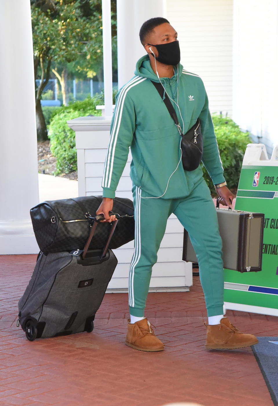 Damian Lillard #0 of the Portland Trail Blazers arrives at the hotel as part of the NBA Restart 2020 on July 9, 2020 in Orlando, Florida. (Photo by Bill Baptist/NBAE via Getty Images)