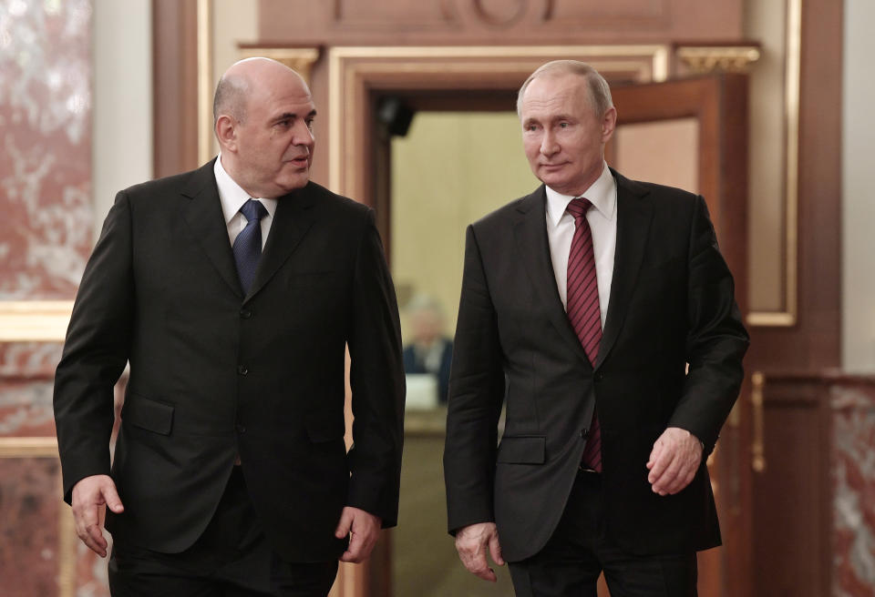 Russian President Vladimir Putin and Prime Minister Mikhail Mishustin meet with members of the new government in Moscow