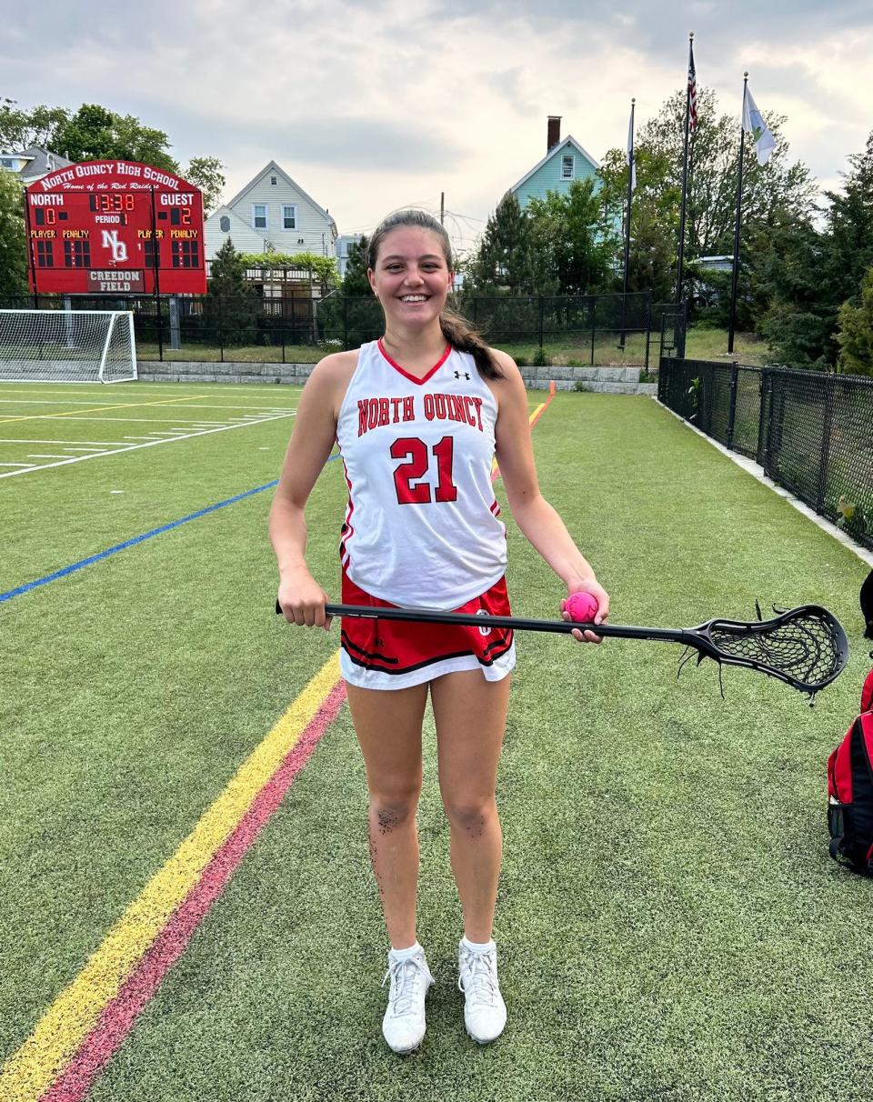North Quincy's Autumn O'Campos poses after recording her 100th career point during a win over Plymouth South as a junior in 2023.