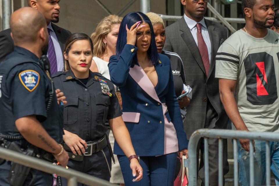 Cardi B leaves court after pleading not guilty to assault charges. (Getty Images)