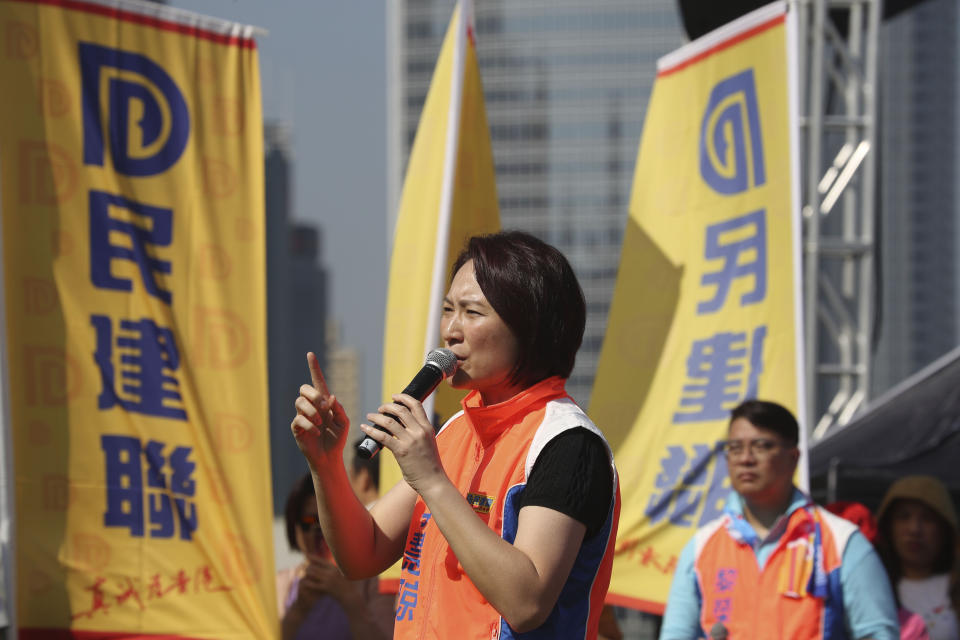 Starry Lee, head of the Democratic Alliance for the Betterment and Progress of Hong Kong, speaks during an event for the party's candidates in the upcoming district elections held in Hong Kong on Thursday, Nov. 21, 2019. A small but determined group of protesters remained holed up Thursday inside a Hong Kong university campus as the city's largest pro-Beijing political party urged voters to "kick out the black force" in upcoming elections seen as a key gauge of public support for anti-government protests. (AP Photo/Ng Han Guan)