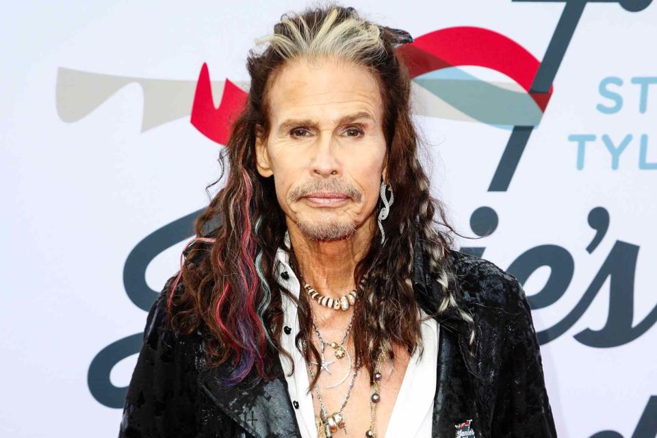 <p>Joe Scarnici/Getty</p> Steven Tyler at his 4th Annual Grammy Awards Viewing Party in 2022.