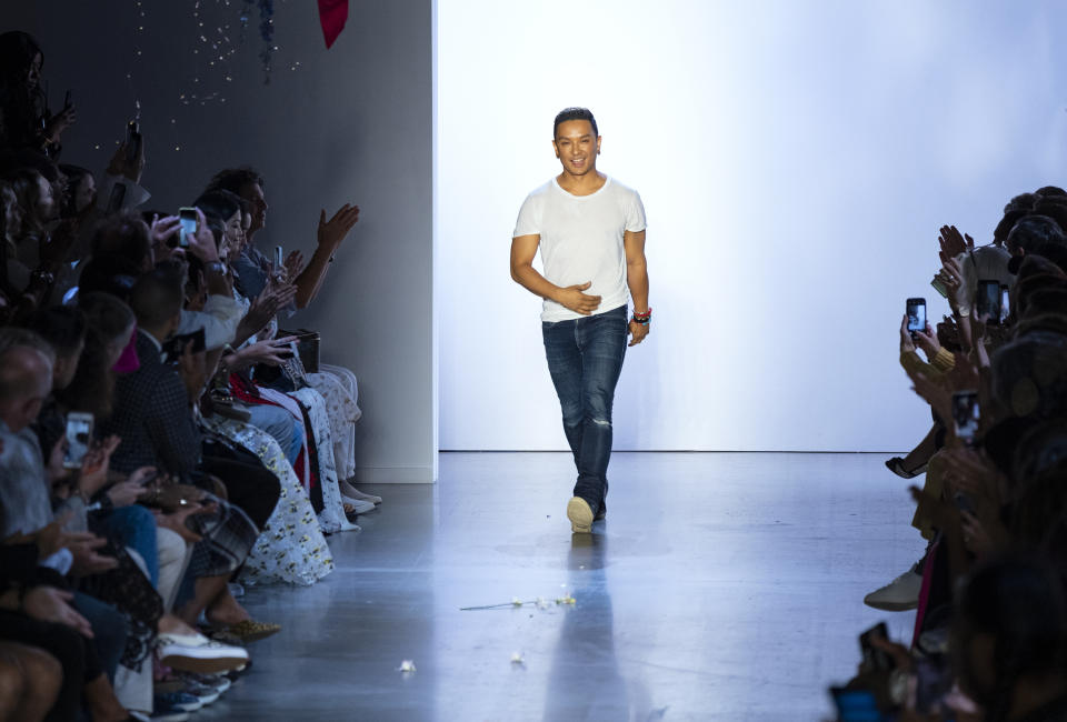 Designer Prabal Gurung takes the runway after his collection was modeled during Fashion Week, Sunday, Sept. 8, 2019 in New York. (AP Photo/Craig Ruttle)