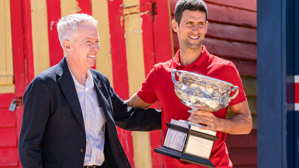 Craig Tiley, pictured here with Novak Djokovic after he won the Australian Open title in 2021.