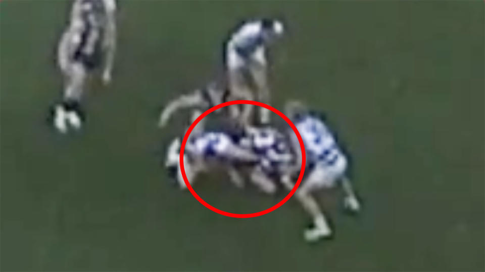 AFL footage shows Patrick Dangerfield's arm being twisted back, highlighted by a red circle.