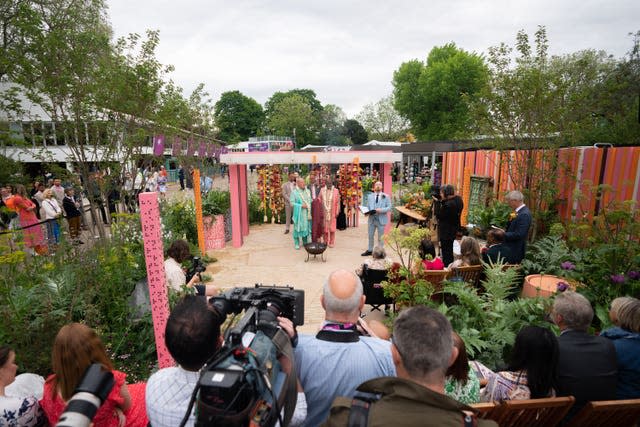 Clive Gillmor and Manoj Malde take part in the first wedding ceremony to be held at the RHS Chelsea Flower Show