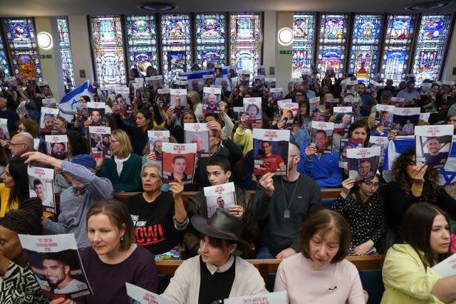 Families of hostages taken in the October 7 Hamas attacks take part in a rally to call for their release at St Johns Wood United Synagogue in London.