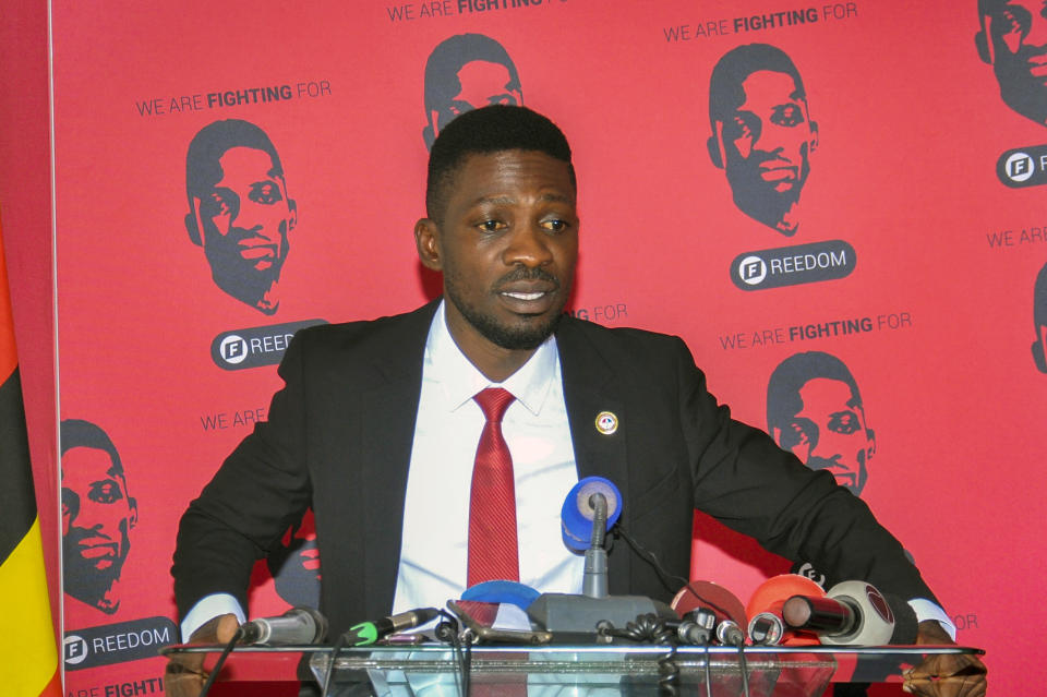Bobi Wine, a singer and lawmaker whose real name is Kyagulanyi Ssentamu, speaks at the National Unity Platform (NUP) head office in the Kamwokya suburb of Kampala, Uganda Monday, Aug. 31, 2020. Bobi Wine, who spoke on Monday to answer questions swirling around his age and academic record, cited "a pattern of repression and suppression" aiming to derail his bid against the long-time president Yoweri Museveni in polls scheduled for 2021. (AP Photo/Ronald Kabuubi)