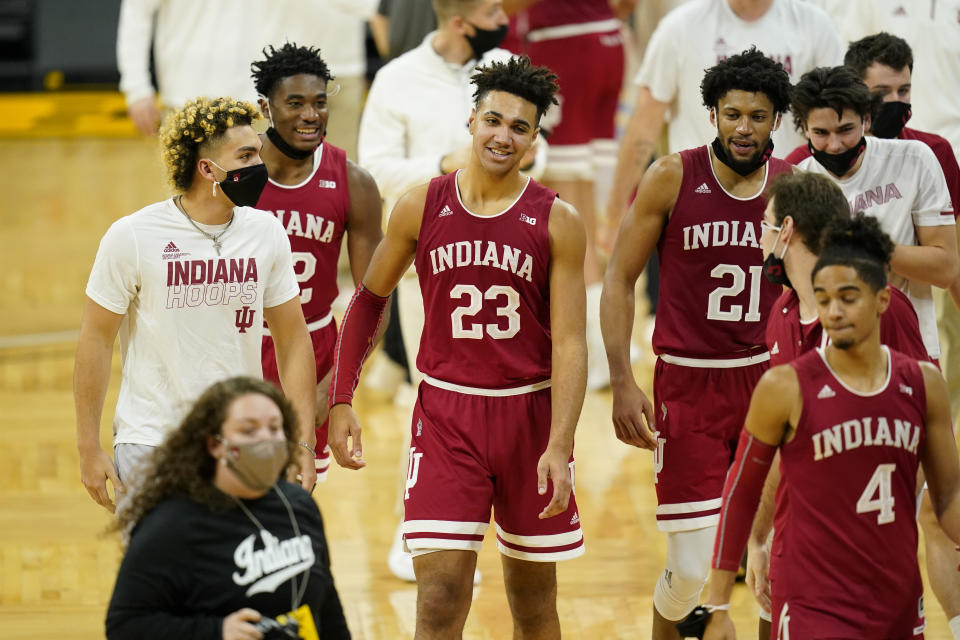 Indiana forward Trayce Jackson-Davis (23) walks off the court with teammates after an NCAA college basketball game against Iowa, Thursday, Jan. 21, 2021, in Iowa City, Iowa. Indiana won 81-69. (AP Photo/Charlie Neibergall)