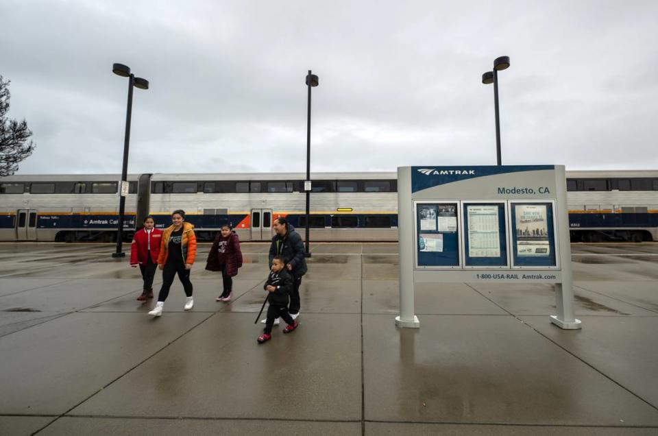 A north bound train drops off passengers at the Modesto Amtrak station in Modesto, Calif., Wednesday, Jan. 24, 2024.