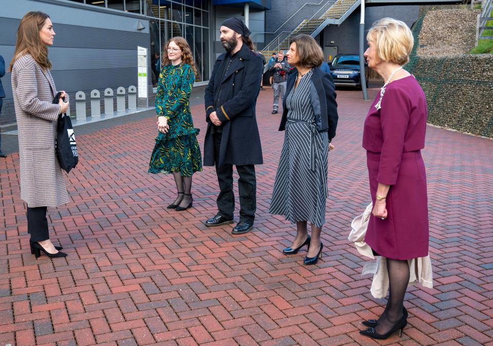 Britain's Catherine, Duchess of Cambridge meets staff and students during her visit to the University of Derby in Derby, central England, on October 6, 2020, where she met students to hear how the novel coronavirus COVID-19 pandemic has impacted university life, and what national measures have been put in place to support student mental health. (Photo by Arthur EDWARDS / POOL / AFP) (Photo by ARTHUR EDWARDS/POOL/AFP via Getty Images)