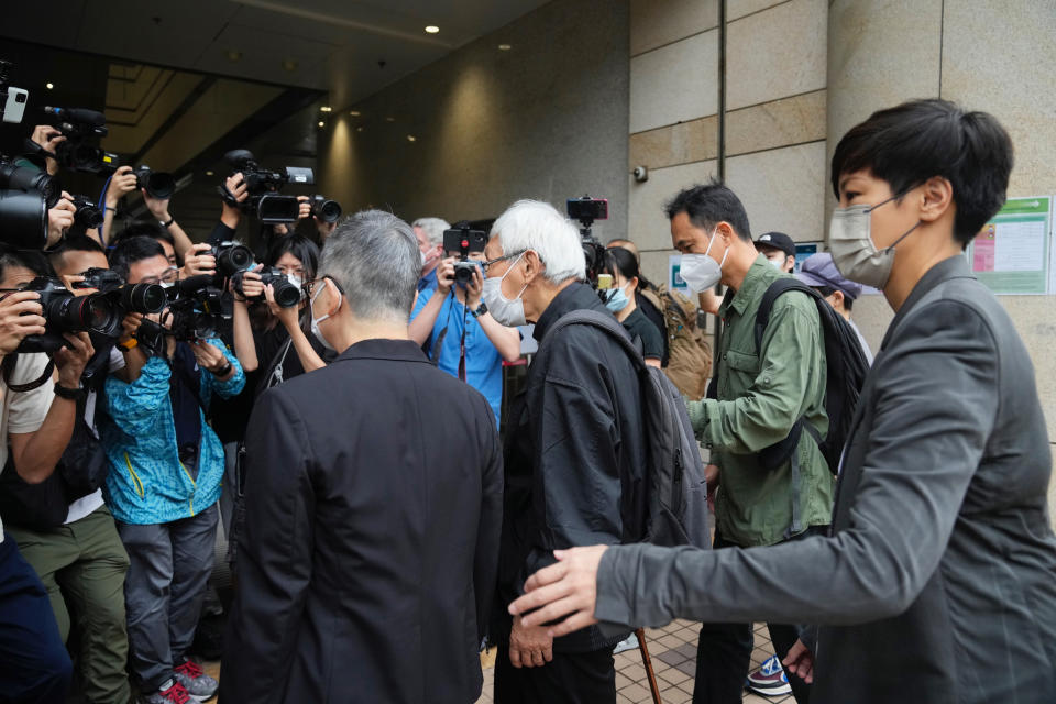 From right, Hong Kong singer Denise Ho, Hong Kong scholar Hui Po-keung, Catholic Cardinal Joseph Zen and barrister Margaret Ng and arrive for an appearance at a court in Hong Kong as they were charged in relation to their past fundraising for activists, Tuesday, May 24, 2022. (AP Photo/Kin Cheung)