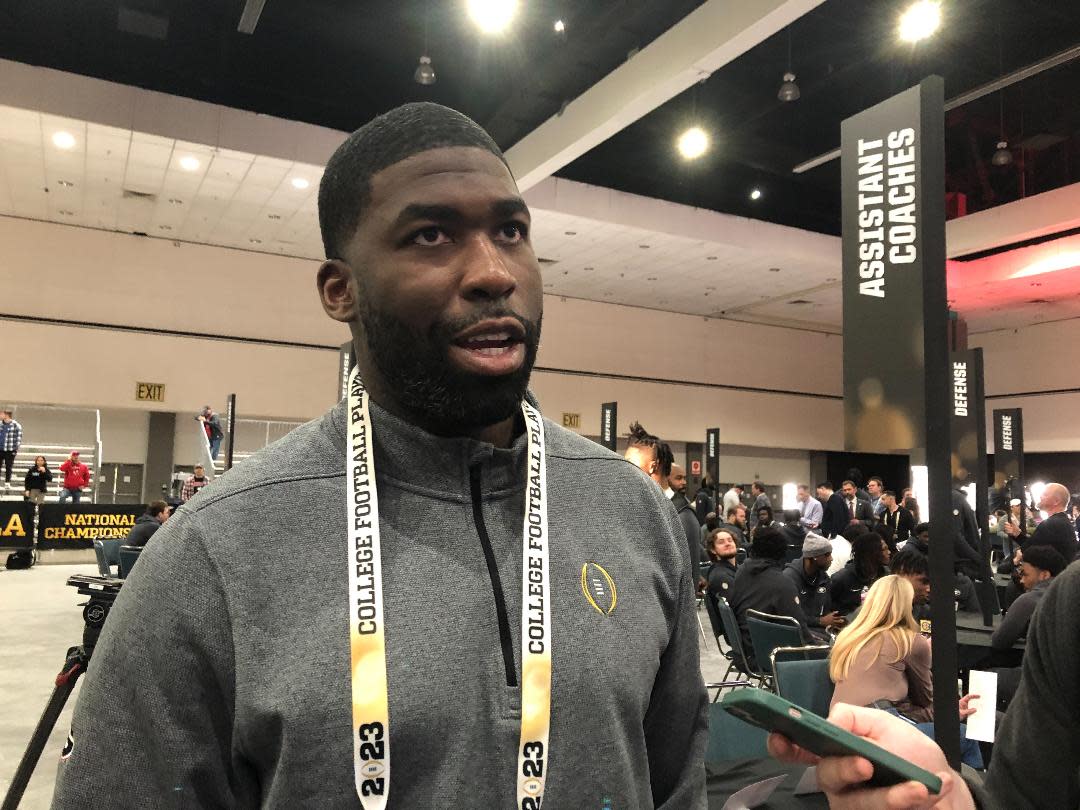 Georgia outside linebackers coach Chidera Uzo-Diribe speaks at College Football Playoff  championship media day on Saturday, Jan. 7, 2023