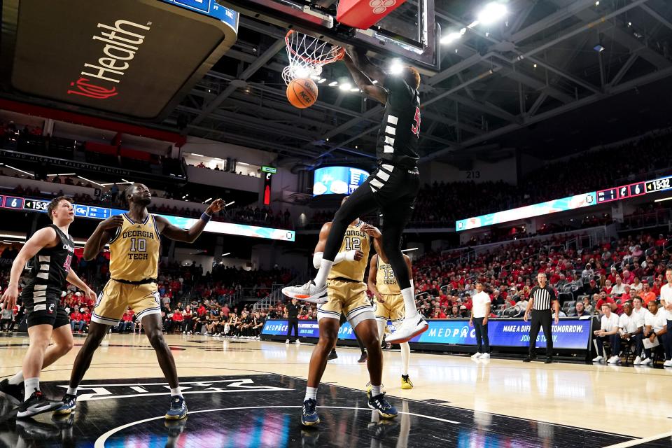 Cincinnati Bearcats forward Aziz Bandaogo (55) dunks in the first half in UC's 89-54 win over Georgia Tech on Wednesday, Nov. 22.