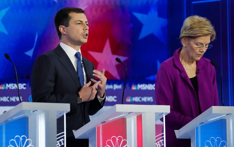 FILE PHOTO: Democratic presidential candidate and South Bend Mayor Pete Buttigieg speaks during a break the fifth 2020 campaign debate at the Tyler Perry Studios in Atlanta, Georgia