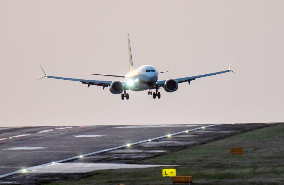 Ryanair flight FR9078 from Alicante landing at Leeds Bradford airport during high winds (PA)