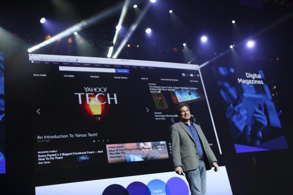 David Pogue, vice president of editorial at Yahoo, announces the beginning of the company's Tech page at the annual Consumer Electronics Show (CES) in Las Vegas, Nevada January 7, 2014 REUTERS/Robert Galbraith (UNITED STATES - Tags: BUSINESS SCIENCE TECHNOLOGY)