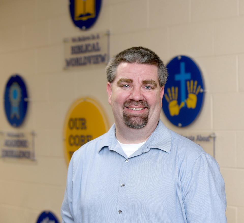 Heath Lambright,  high school science teacher at Lake Center Christian, The Canton Repository Walsh University Teacher of the Month for December.  Tuesday, December 6, 2022.