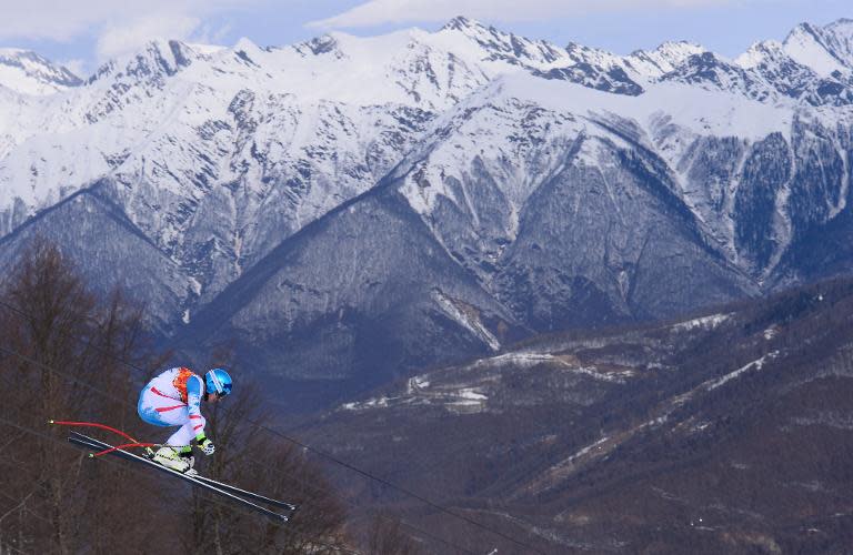 Austria's Matthias Mayer competes during the Men's Alpine Skiing Downhill at the Rosa Khutor Alpine Center during the Sochi Winter Olympics on February 9, 2014