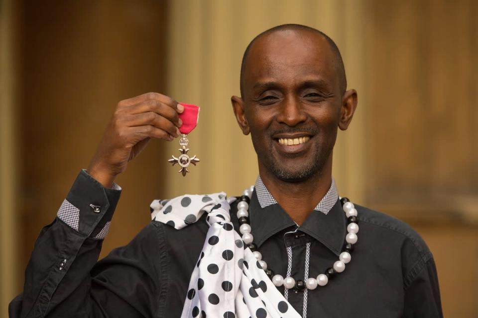 Eric Murangwa with his MBE medal, awarded by the Prince of Wales (PA) (PA Archive)