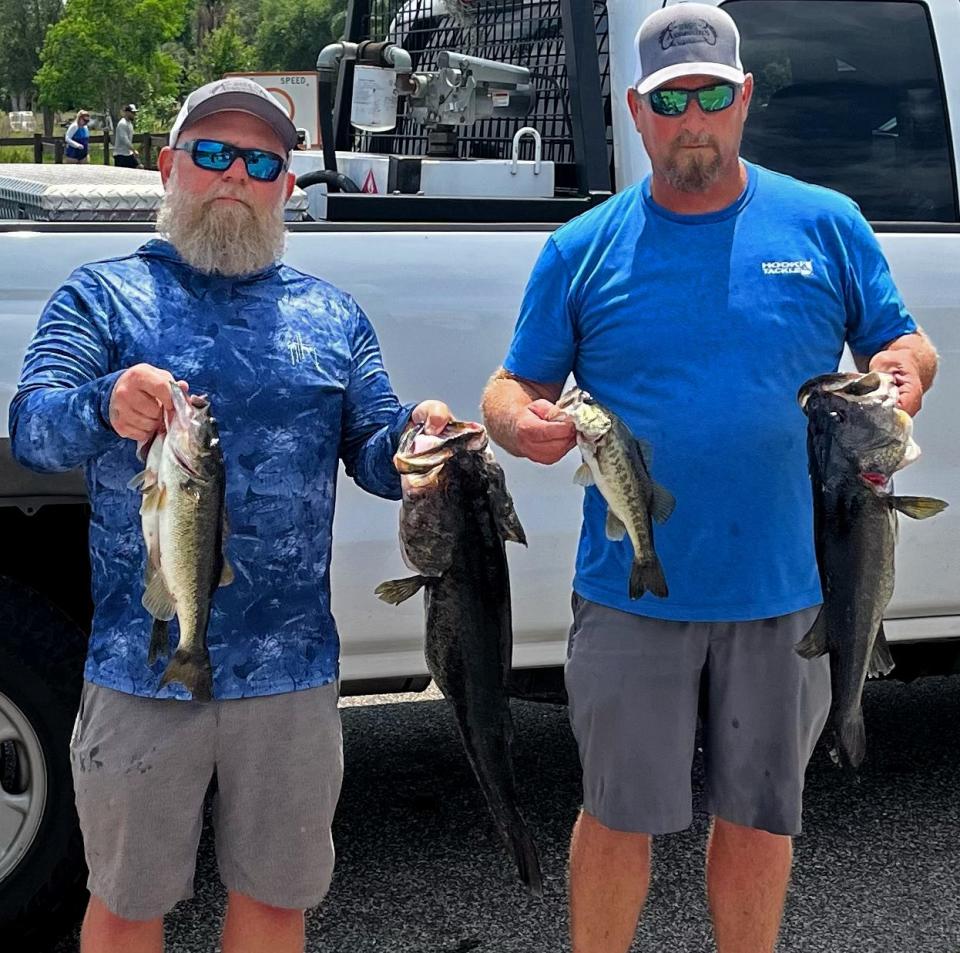 Stephen Stover, left, and Shane Foster had 20.35 pounds and also big bass with an 8.71-pounder to win the Bass Assassins of Polk County tournament April 15 at Johns Lake.