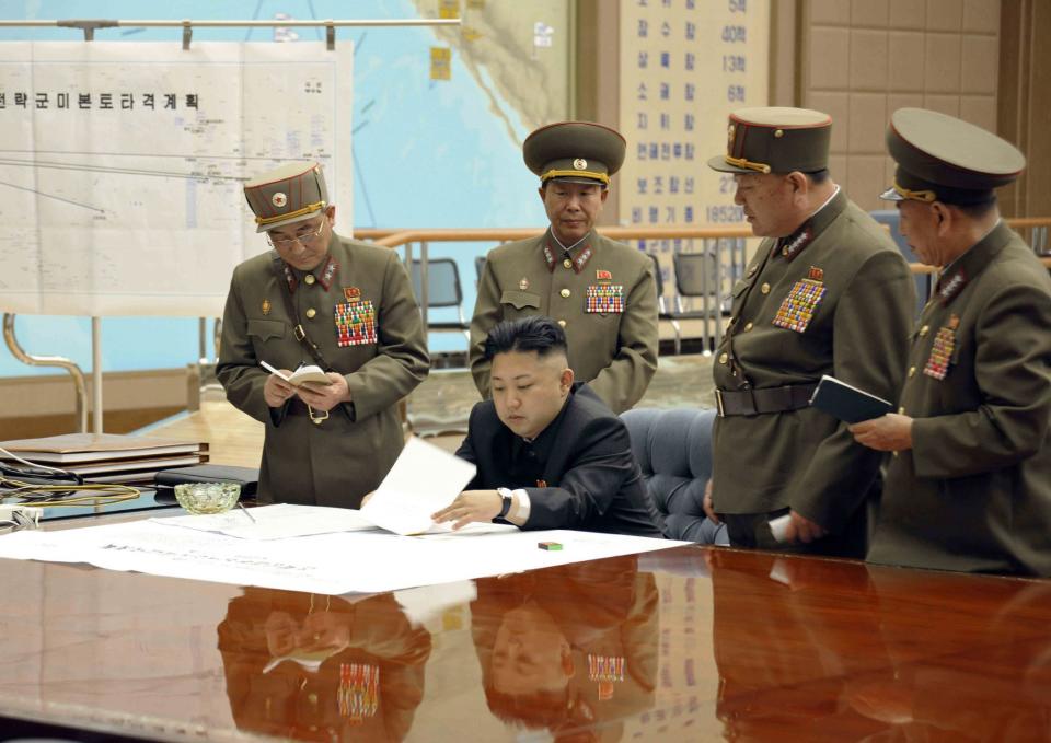 North Korean leader Kim Jong-un presides over an urgent operation meeting