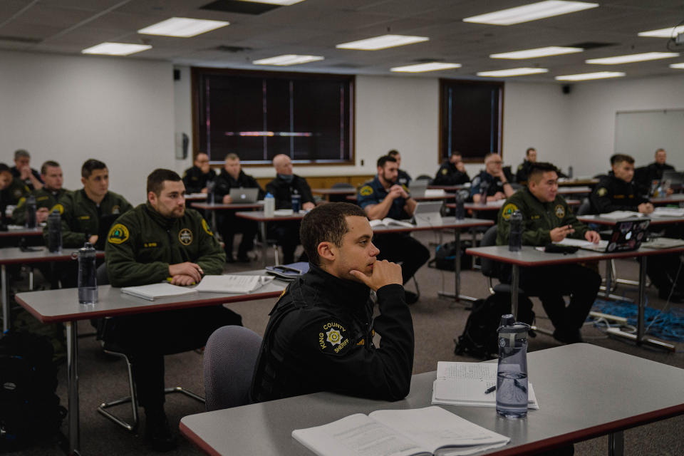 Recruits attend a criminal law class.<span class="copyright">Jovelle Tamayo for TIME</span>