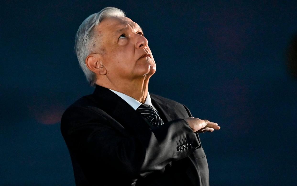 Andrés Manuel López Obrador looks to the skied, or the gods