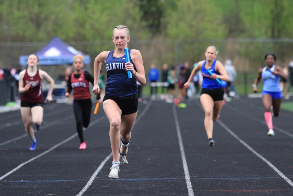 Granville's Hope Mahl runs the anchor leg of the 400 relay at the Granville Invitational on Friday.