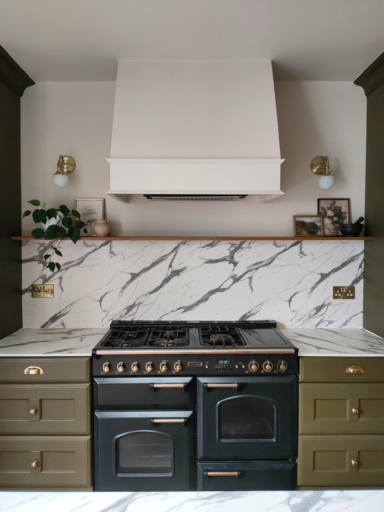 The couple's kitchen after the transformation, the oven would have cost £500 new. (Louise Horton/SWNS)