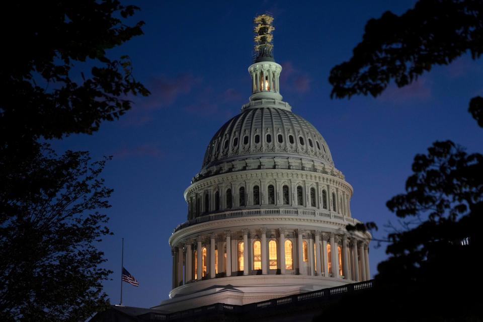 Night falls on the dome of the Capitol, hours after Rep. Kevin McCarthy, R-Calif., was ousted as Speaker of the House, Tuesday, Oct. 3, 2023, in Washington.