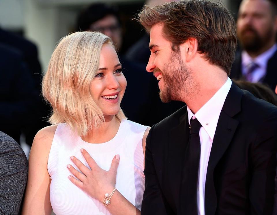 hollywood, ca october 31 actors jennifer lawrence and liam hemsworth attend lionsgates the hunger games mockingjay part 2 hand and footprint ceremony at tcl chinese theatre on october 31, 2015 in hollywood, california photo by frazer harrisongetty images