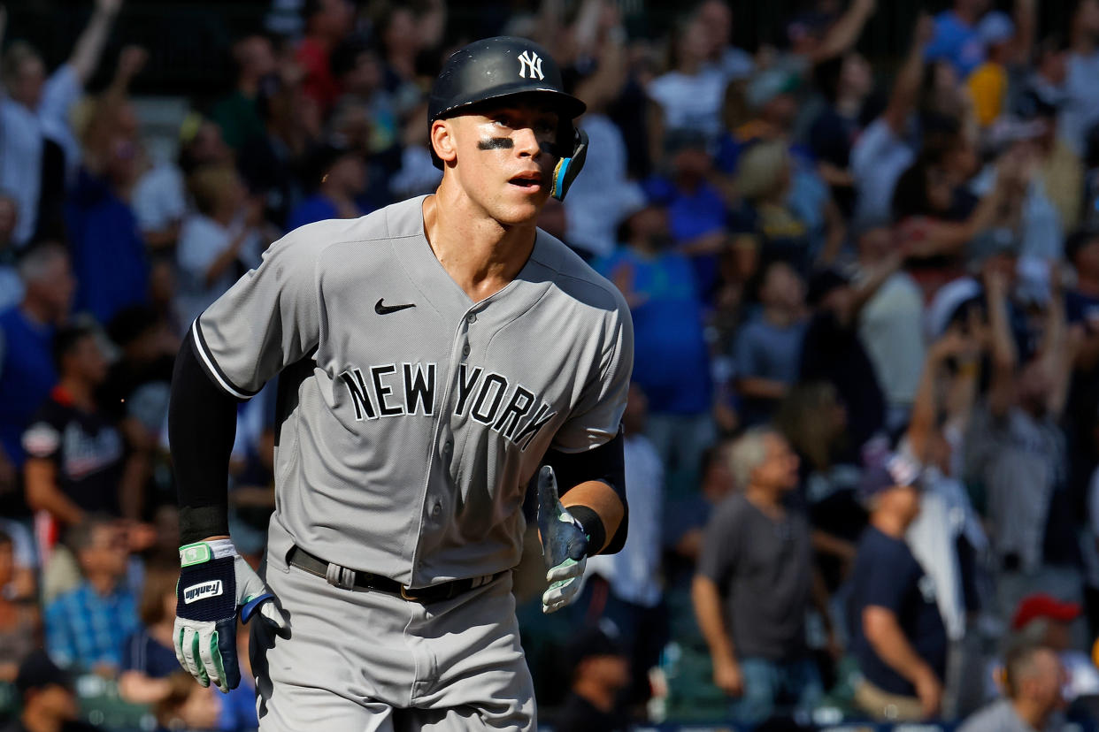MILWAUKEE, WISCONSIN - SEPTEMBER 18: Aaron Judge #99 of the New York Yankees hits a home run in the seventh inning against the Milwaukee Brewers at American Family Field on September 18, 2022 in Milwaukee, Wisconsin. (Photo by John Fisher/Getty Images)