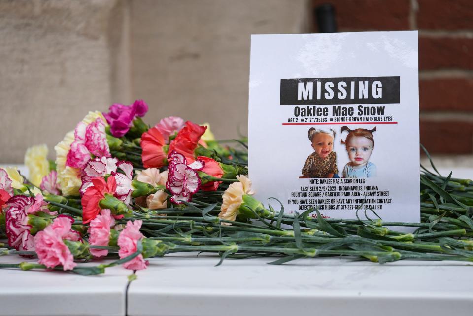 A prayer vigil and informational table were set up for 2-year-old Oaklee Snow on Monday, April 17, 2023, outside of City Market in Indianapolis. In January, Snow was taken from her father's home in Oklahoma without his consent by her mother, Madison Marshall. Snow was last seen by a witness in Indianapolis in February, but remains missing. 