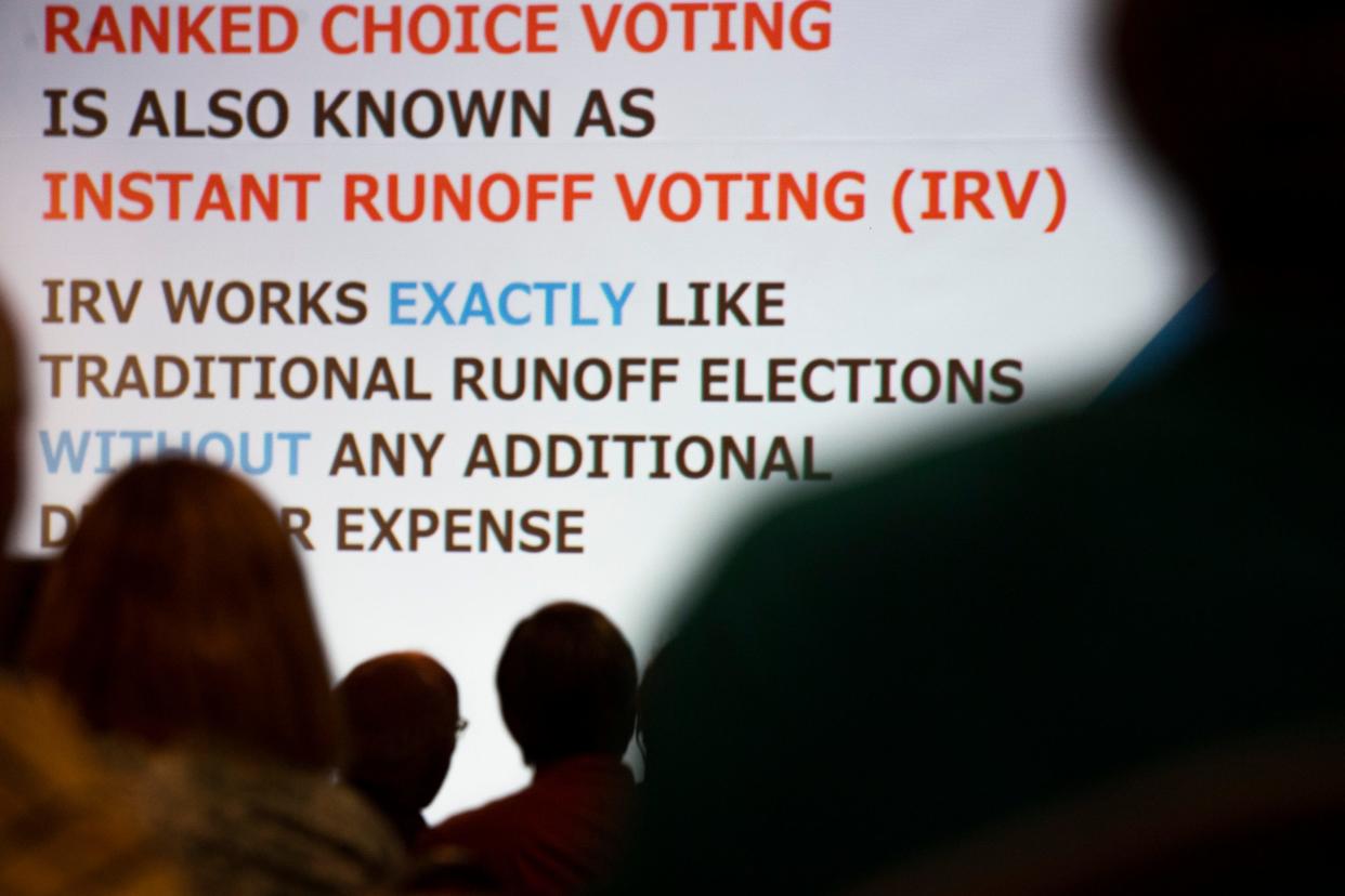 Kathleen Schmidt, the elections reform chair for the League of Women Voters explains ranked choice voting to members of the Fort Collins Rotary Club at the Lincoln Center in Fort Collins, Colorado, Wednesday, April 27, 2022.