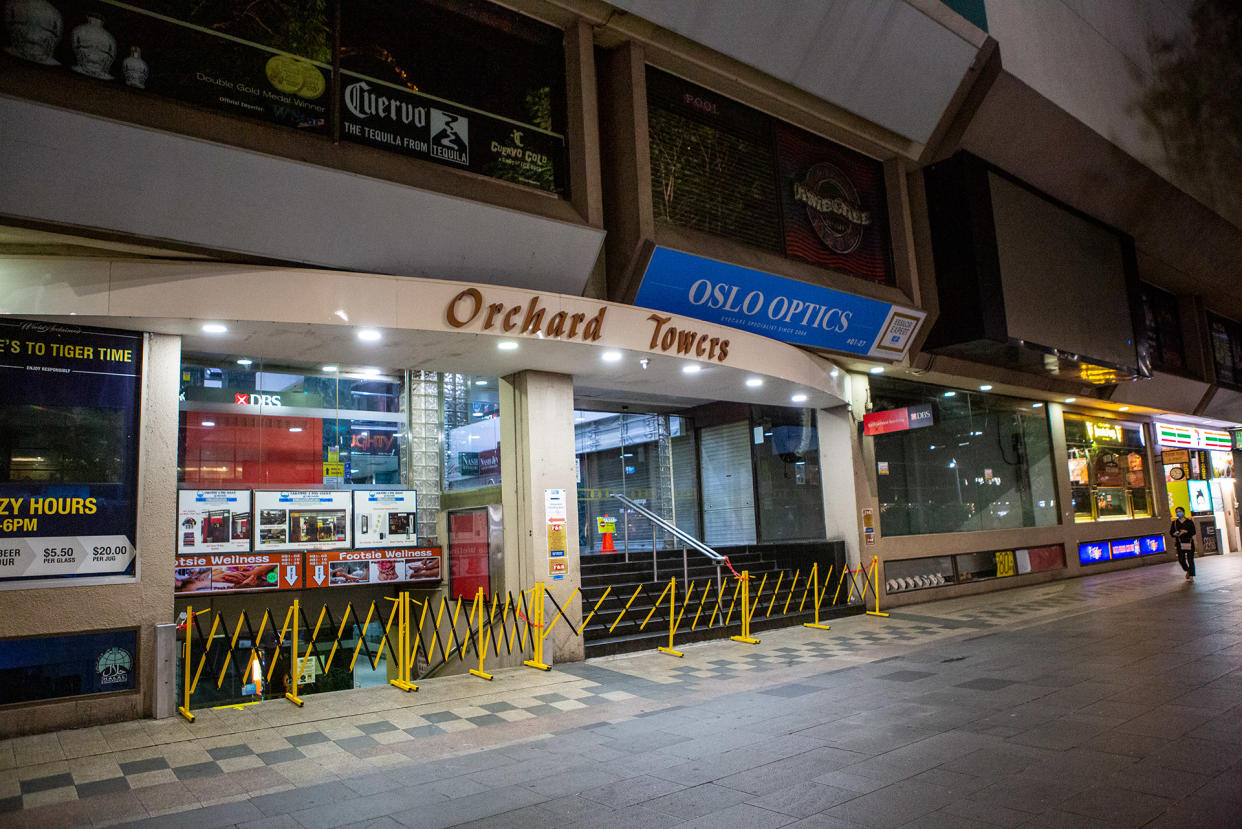 The entrance to Orchard Towers seen blocked off in the early hours of 18 April 2020, Day 12 of the country's partial lockdown. (PHOTO: Dhany Osman / Yahoo News Singapore)