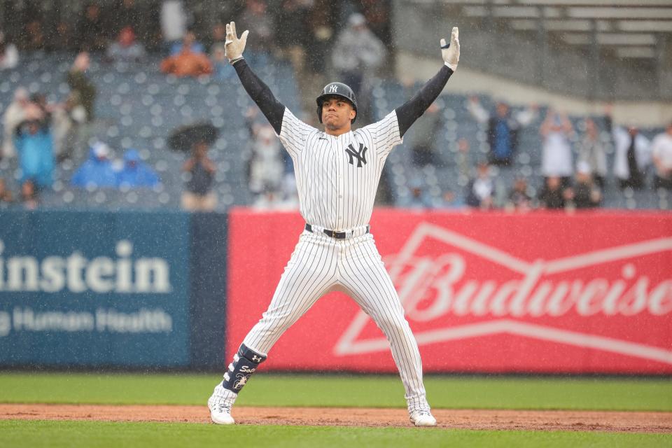 New York Yankees right fielder Juan Soto (22) reacts after his three-run double during the seventh inning against the Detroit Tigers at Yankee Stadium in New York on Sunday, May 5, 2024.