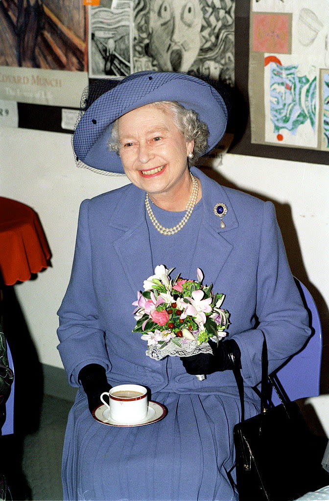 The Queen's former butler has revealed exactly how the Queen takes her tea, pictured in 1998. (Getty Images)
