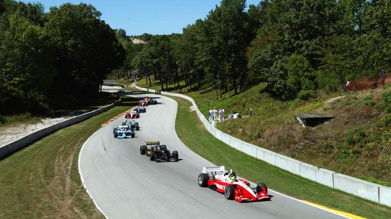 A photo of race cars on track at Road America. 