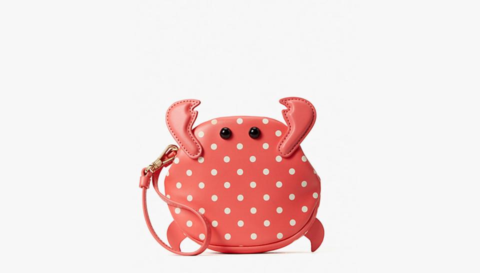 Carry this whimsical wristlet on all your outings.