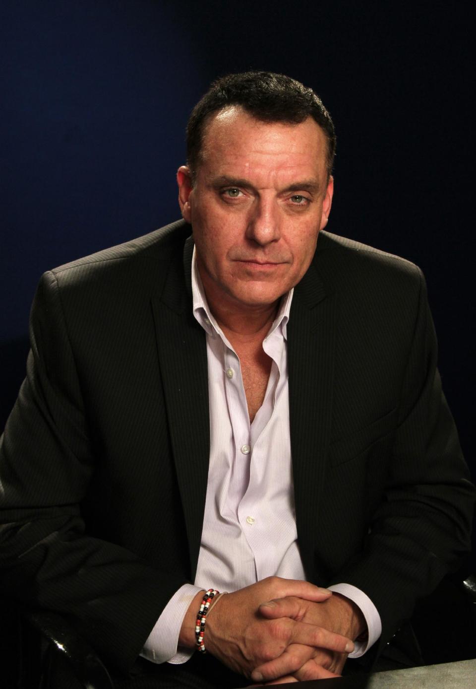 This April 18, 2013 photo shows actor Tom Sizemore in New York. With acclaimed performances in movies like “Saving Private Ryan,” and “Black Hawk Down” Sizemore faded into oblivion, trading his work in front of the camera for the haze of heroin and crystal meth. Sizemore's memoir, "By Some Miracle I Made it Out of There," is a no-holds barred portrayal of the actor's struggle. (AP Photo/John Carucci)