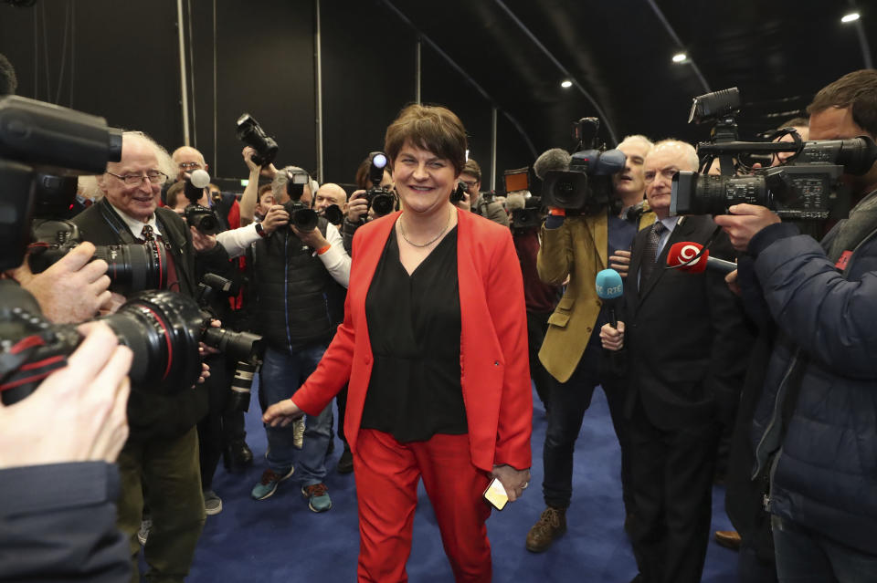 Leader of the Democratic Unionist Party Arlene Foster arrives as the counting continues at the Titanic exhibition centre, Belfast, Northern Ireland for the 2019 general election, Friday Dec. 13, 2019. The first handful of results to be declared in Britain's election are showing a surge in support for to the Conservatives in northern England seats where Labour has long been dominant. (Liam McBurney/PA via AP)