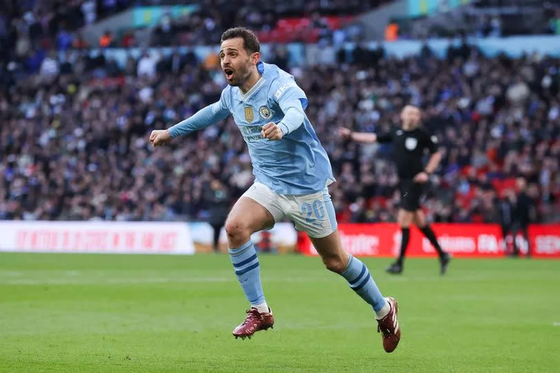 Bernardo Silva of Manchester city celebrates after scoring his side's first goal during the Emirates FA Cup Semi Final match between Manchester City and Chelsea at Wembley Stadium on April 20, 2024