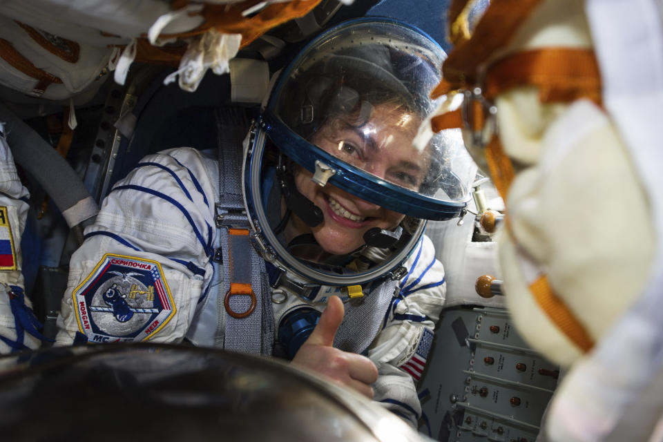 In this handout photo released by Gagarin Cosmonaut Training Centre (GCTC), Roscosmos space agency, U.S. astronaut Jessica Meir sits in the capsule shortly after the landing of the Russian Soyuz MS-15 space capsule near Kazakh town of Dzhezkazgan, Kazakhstan, Friday, April 17, 2020. An International Space Station crew has landed safely after more than 200 days in space. The Soyuz capsule carrying NASA astronauts Andrew Morgan, Jessica Meir and Russian space agency Roscosmos' Oleg Skripochka touched down on Friday on the steppes of Kazakhstan. (Andrey Shelepin, Gagarin Cosmonaut Training Centre (GCTC), Roscosmos space agency, via AP)