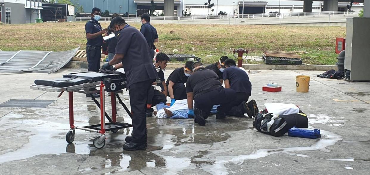 SCDF's Emergency Medical Services (EMS) crew attending to one of the injured persons. (PHOTO: Singapore Civil Defence Force Facebook page)
